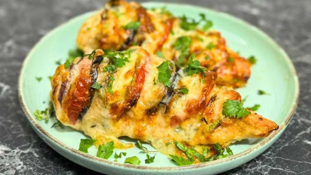 Cheesy Hasselback Chicken & Veggie Medley Bake in a plate