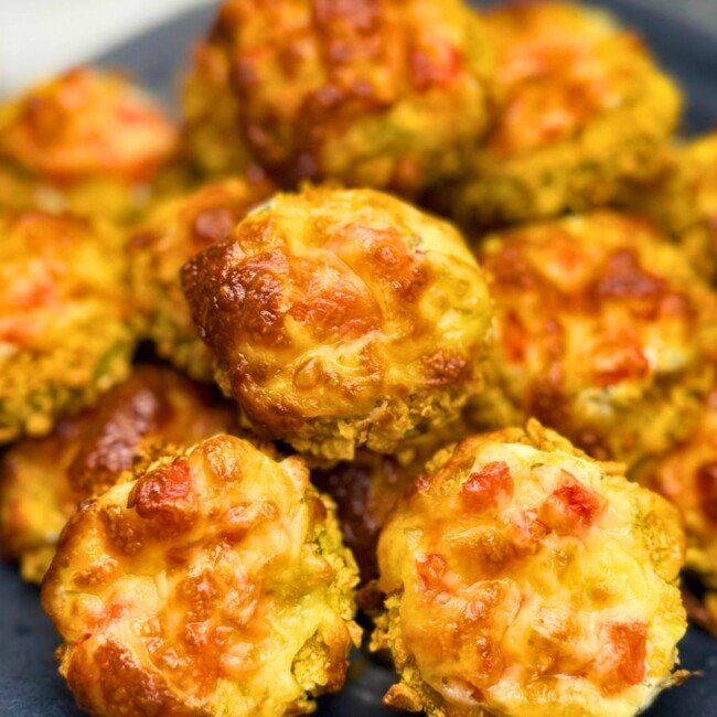 A plate of Crispy Baked Zucchini Rolls with Best Dipping Sauce