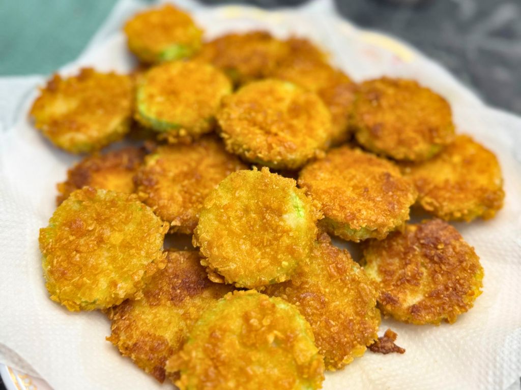 front side shot of a plate full of fried zucchini