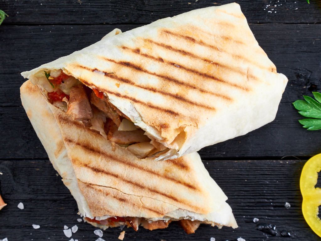 Grilled Chicken Wrap cut in two.