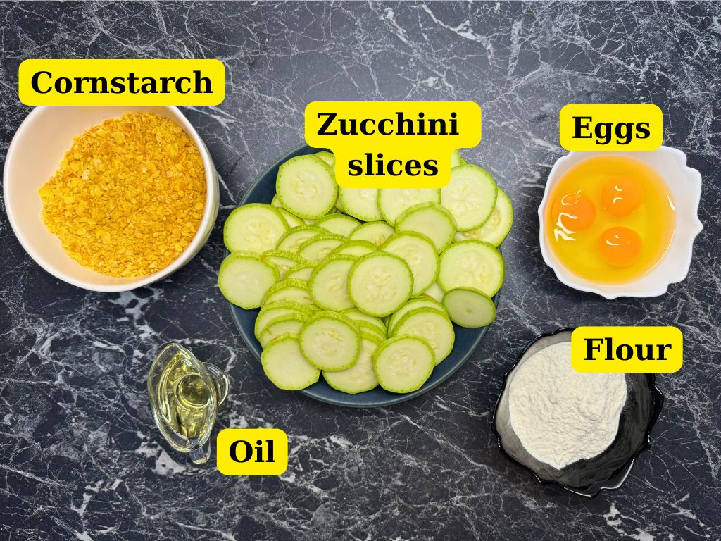 overhead shot of ingredients needed to make crispy fried zucchini