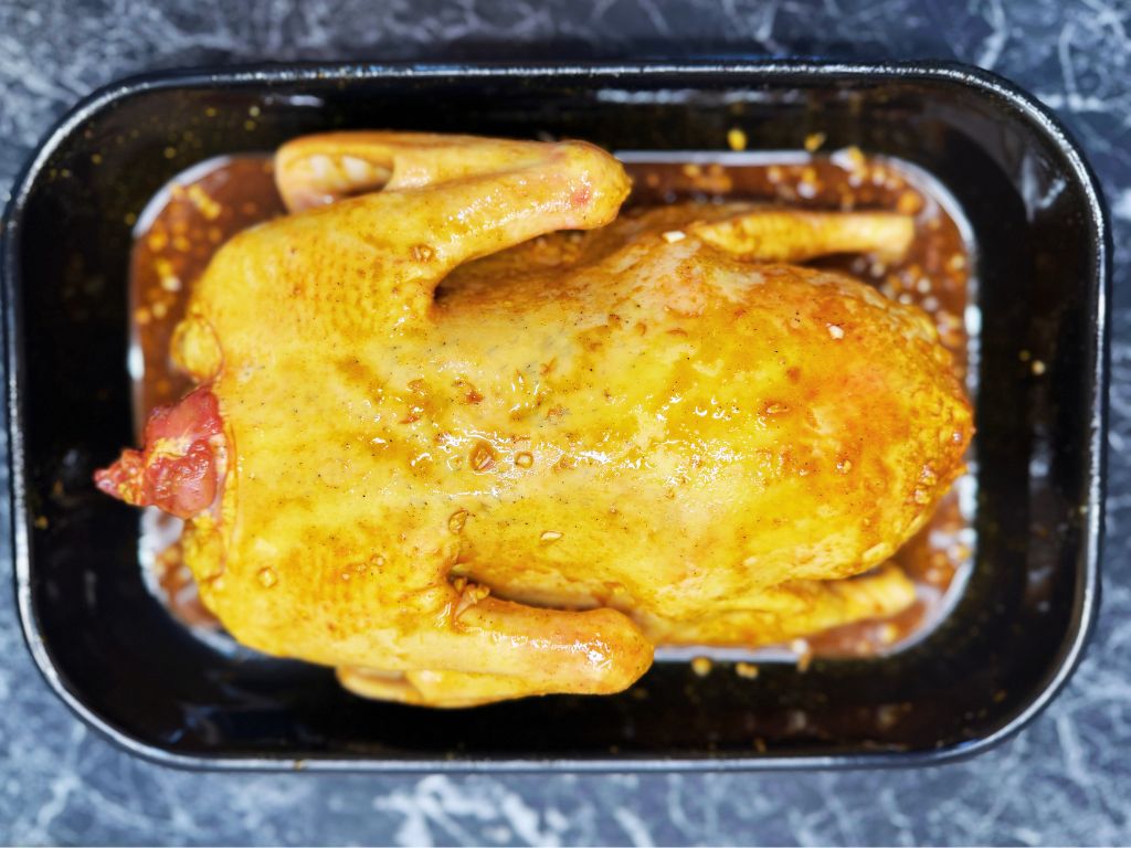 Whole Duck in a deep dish.