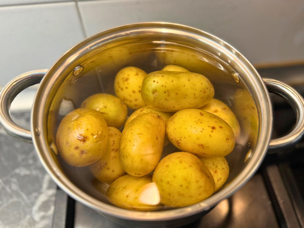 A pot of potatoes simmering