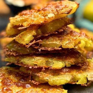 Front shot of several pieces of Cheesy Smashed Potatoes