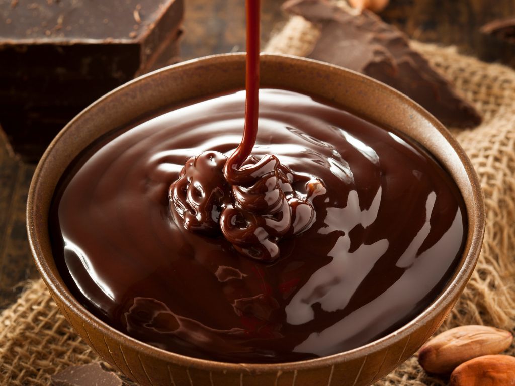A bowl with chocolate sauce for Chocolate Fruit Waffles decoration