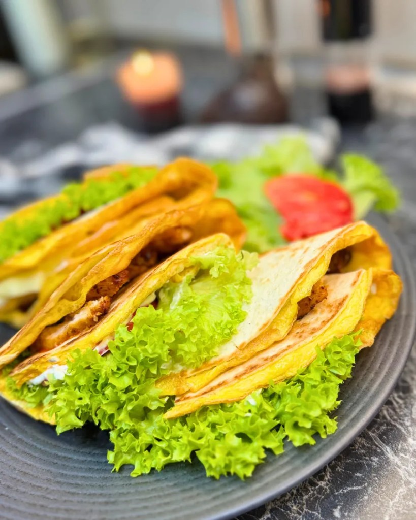 Juicy chicken tortilla wraps filled with egg, cheese, and crisp lettuce.