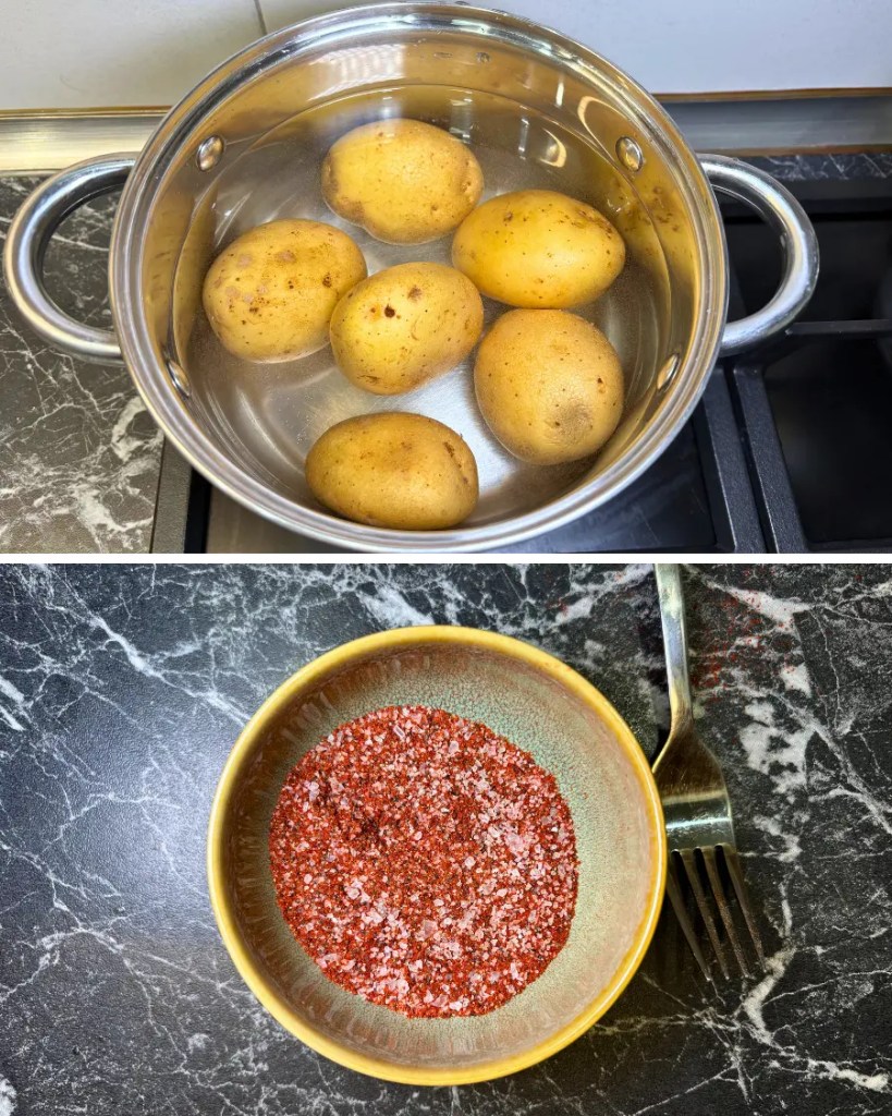 Whole potatoes boiling in water next to homemade seasoning mix for crispy smashed potatoes recipe